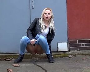 Hot Blonde In Denim Caught Pissing Outside