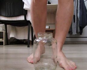 MILF peeing profusely in a jar