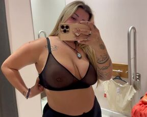 BIG TITS MILF TRIES ON THE MOST TRANSPARENT TOPS IN A STORE