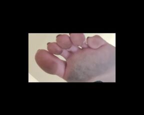 Giantess with dirty feet smashing a little man